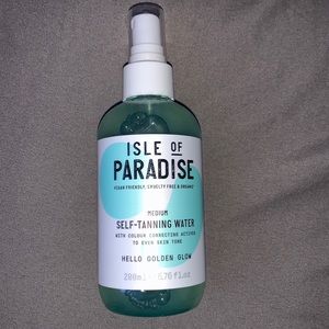 (NWOT) ISLE OF PARADISE TANNING WATER